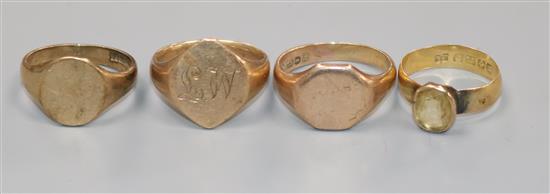 Three 9ct gold signet rings and an 18ct gold and gem set ring.